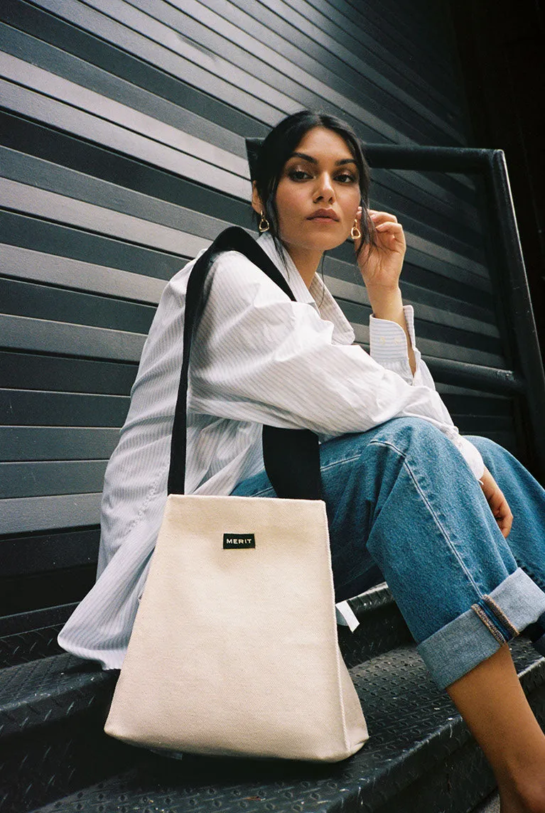 New Merit Beauty Summer Bag! Extremely thick cloth material! Cute medium tote and wide straps covers shoulders
