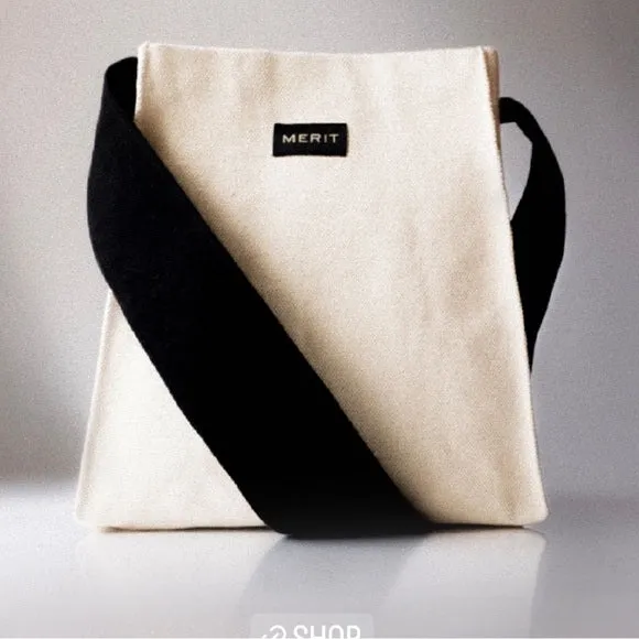 New Merit Beauty Summer Bag! Extremely thick cloth material! Cute medium tote and wide straps covers shoulders