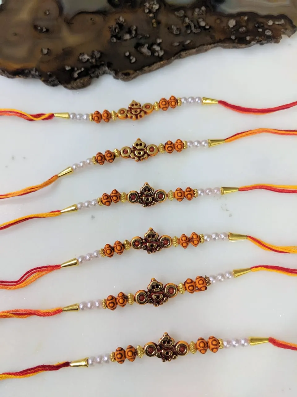(Set of 6) Ganesh Ji Rakhi Designer Golden Beads White Pearl Multicolor Thread Rakhi For Men