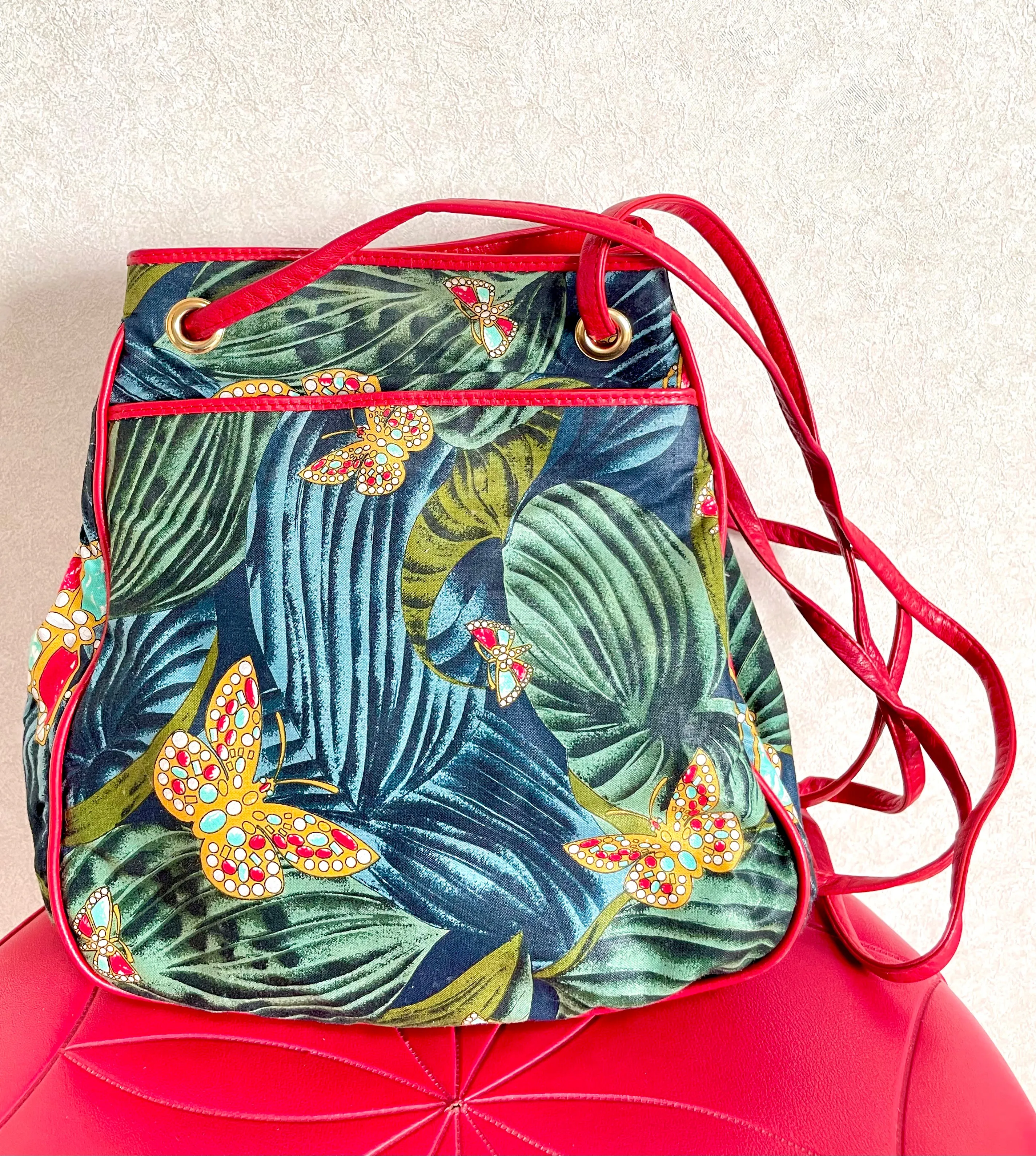 Vintage Bottega Veneta butterfly and leaf printed hobo bag with red leather trimmings. 050327ys3