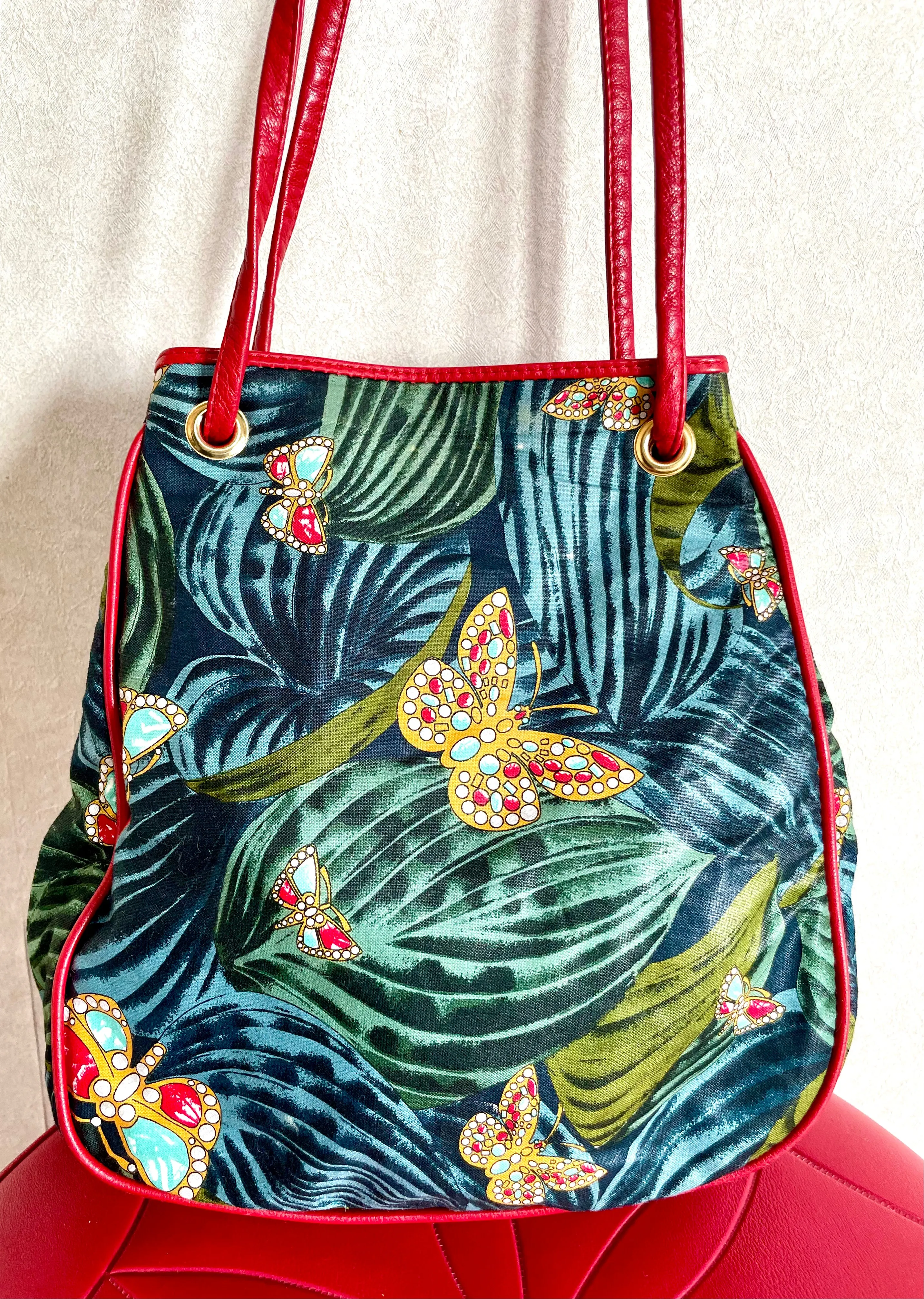 Vintage Bottega Veneta butterfly and leaf printed hobo bag with red leather trimmings. 050327ys3