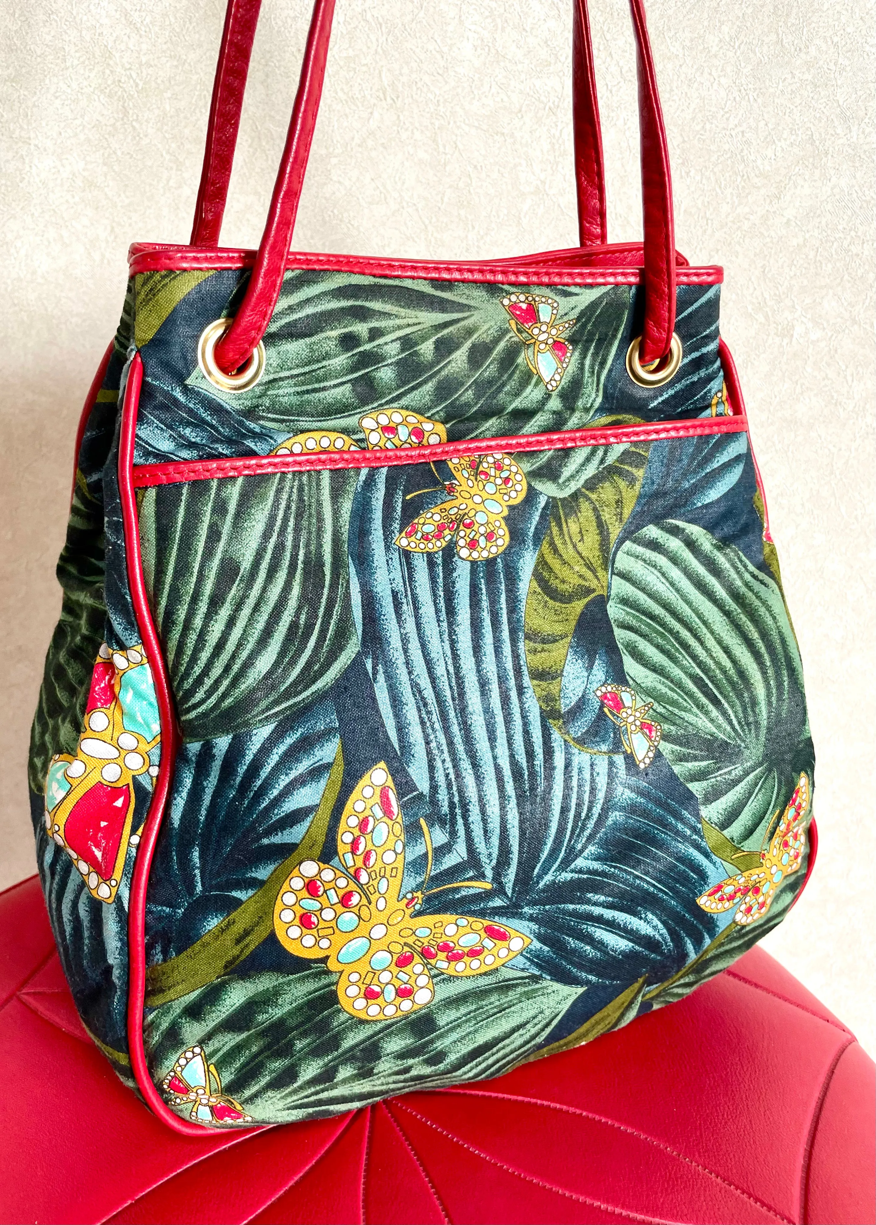 Vintage Bottega Veneta butterfly and leaf printed hobo bag with red leather trimmings. 050327ys3