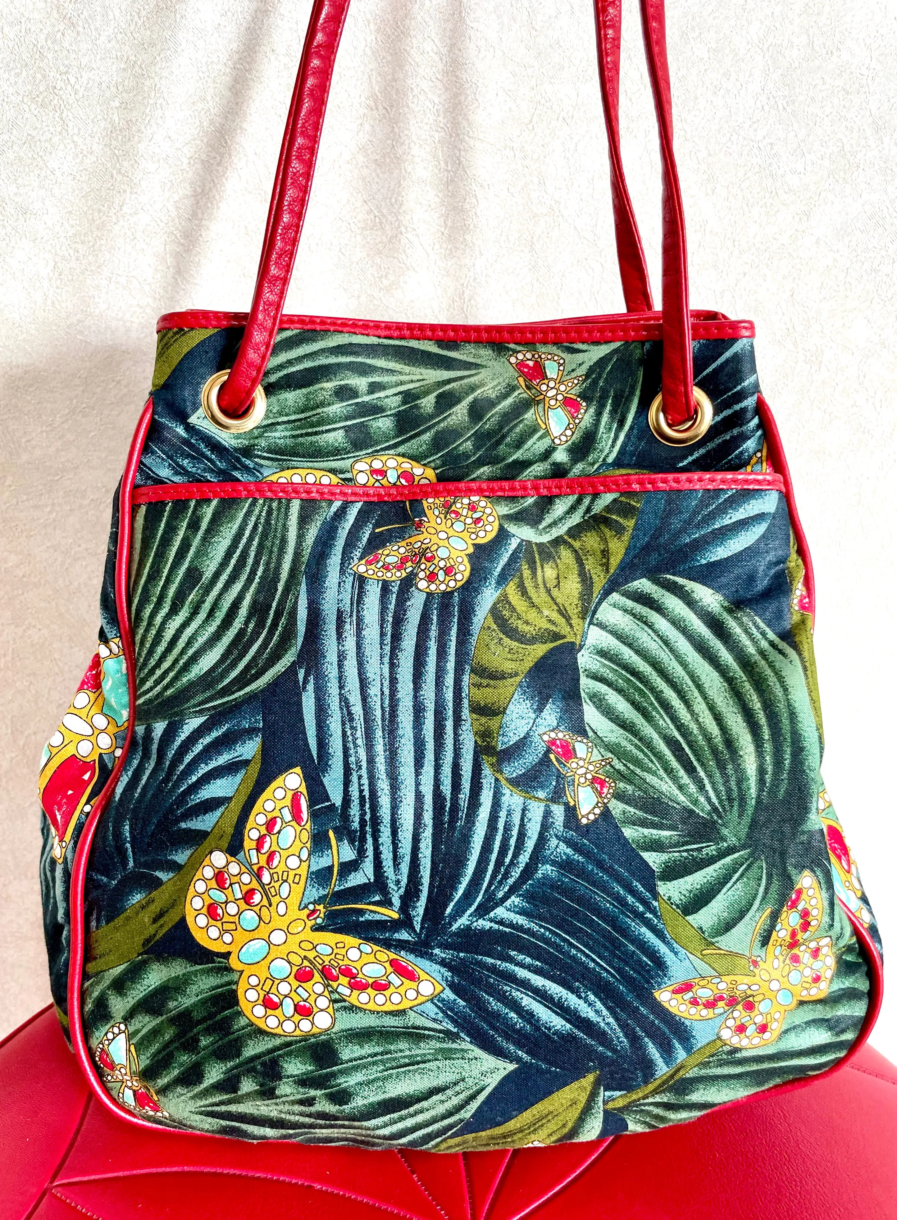 Vintage Bottega Veneta butterfly and leaf printed hobo bag with red leather trimmings. 050327ys3