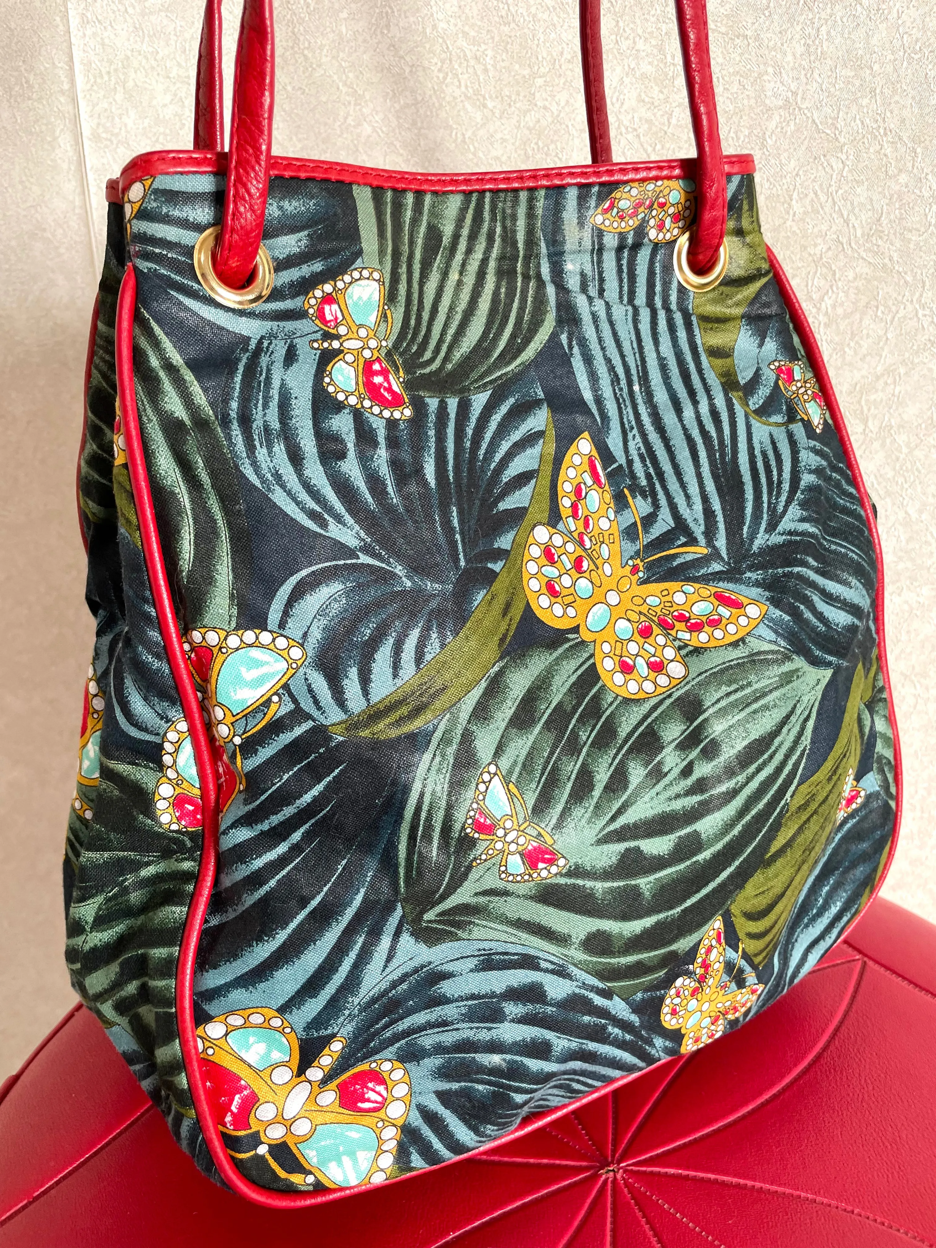 Vintage Bottega Veneta butterfly and leaf printed hobo bag with red leather trimmings. 050327ys3