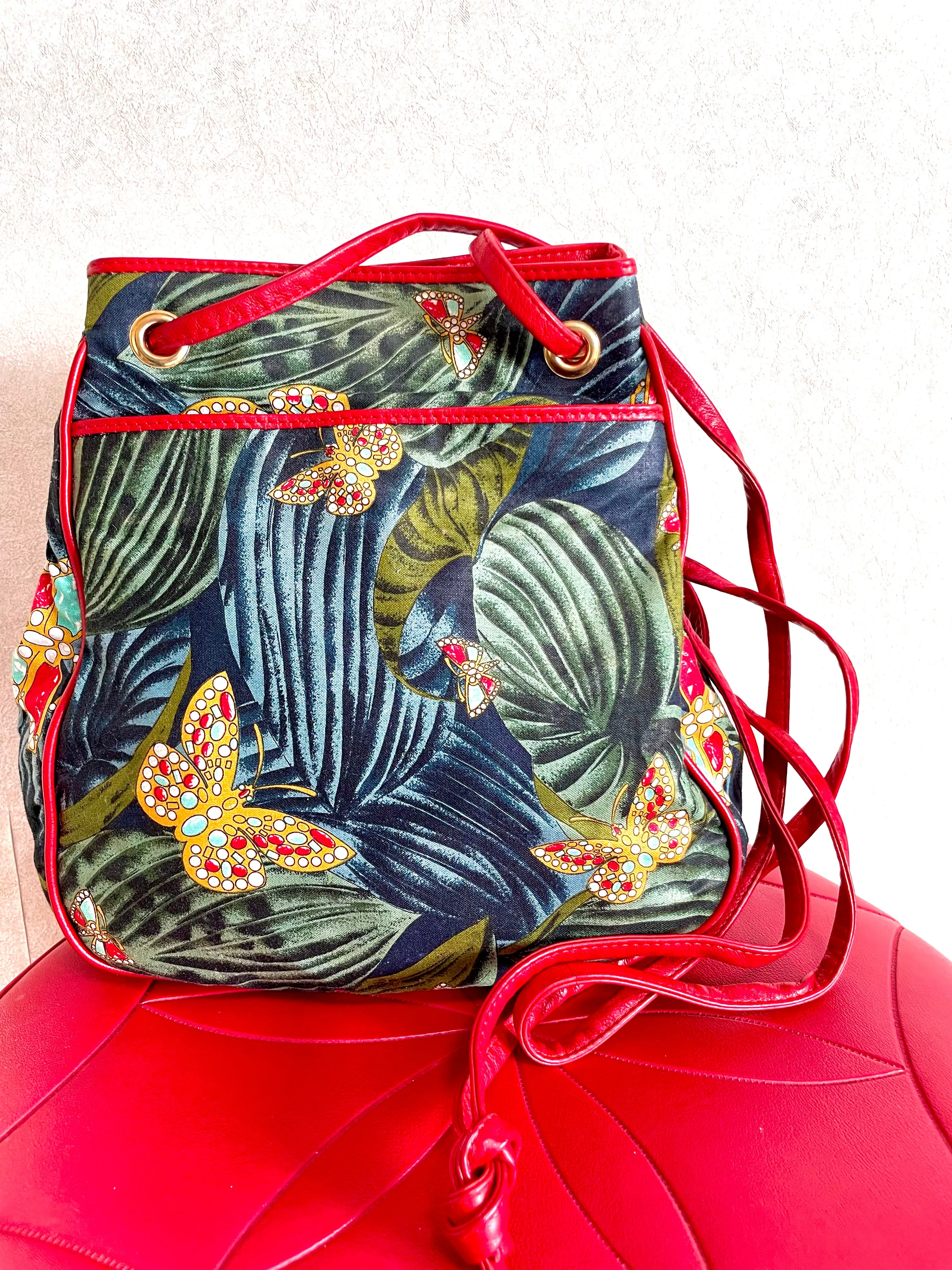 Vintage Bottega Veneta butterfly and leaf printed hobo bag with red leather trimmings. 050327ys3