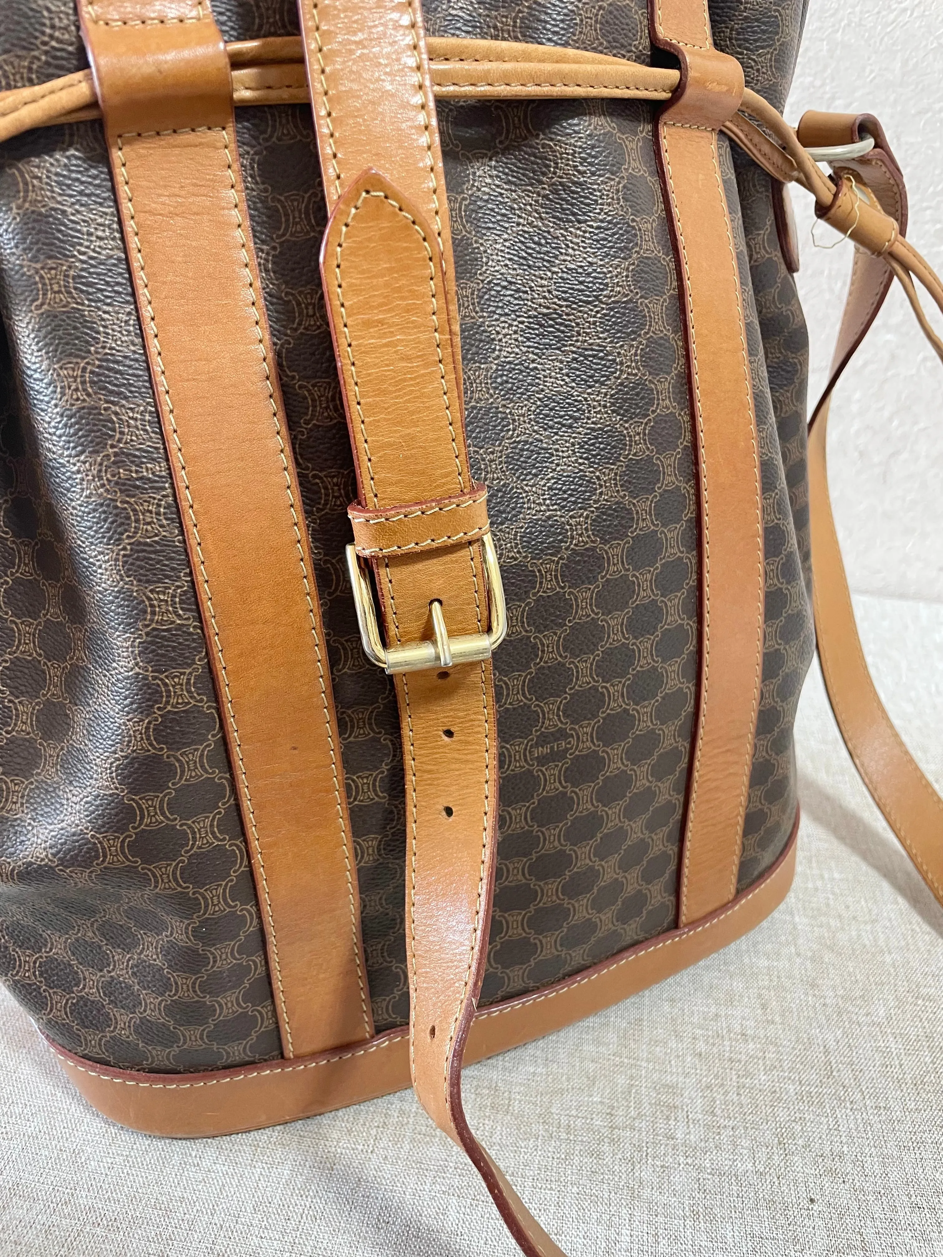 Vintage Celine hobo bucket shoulder bag in classic brown triomphe pattern with leather straps. 070218ys8