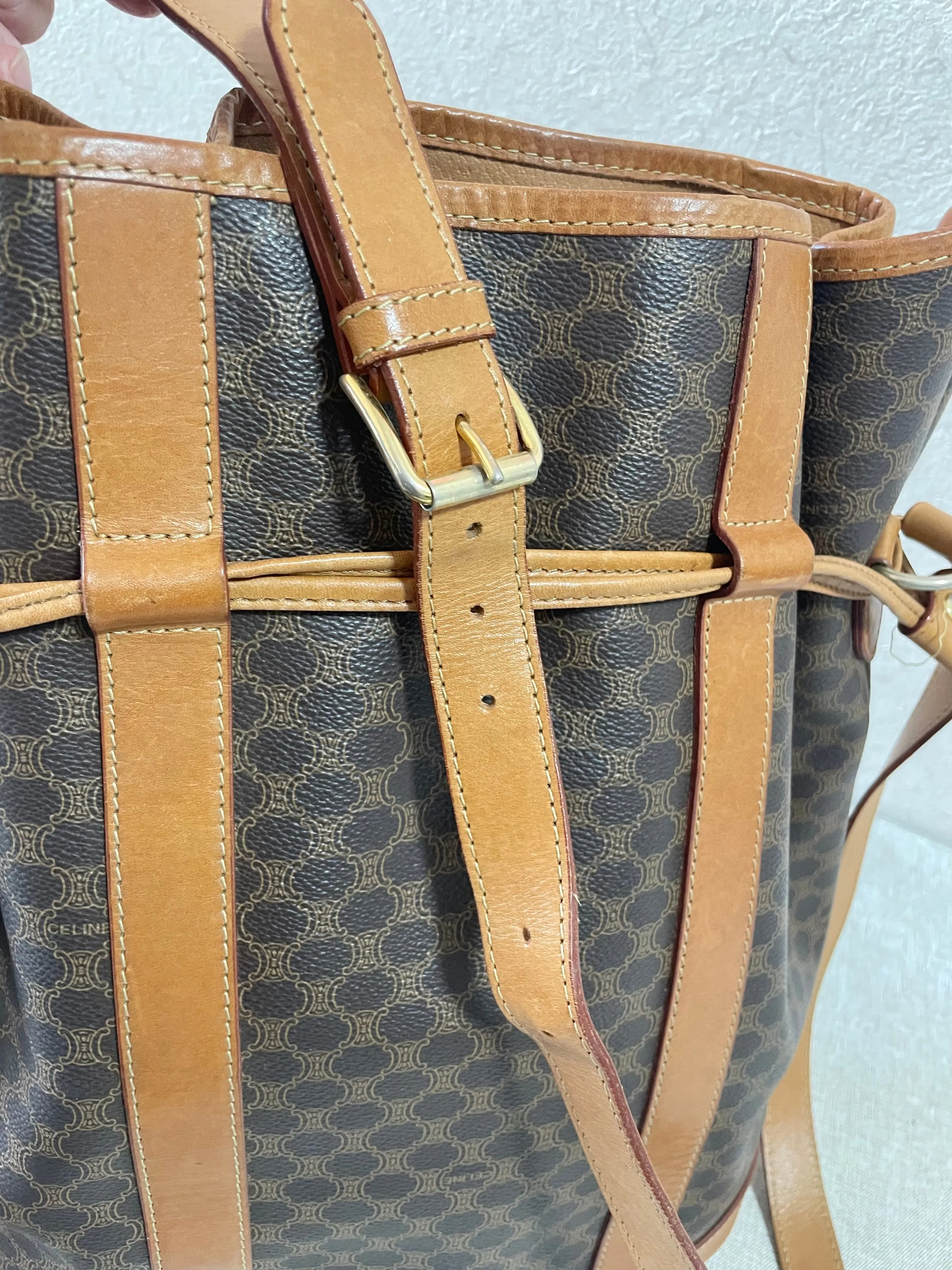 Vintage Celine hobo bucket shoulder bag in classic brown triomphe pattern with leather straps. 070218ys8