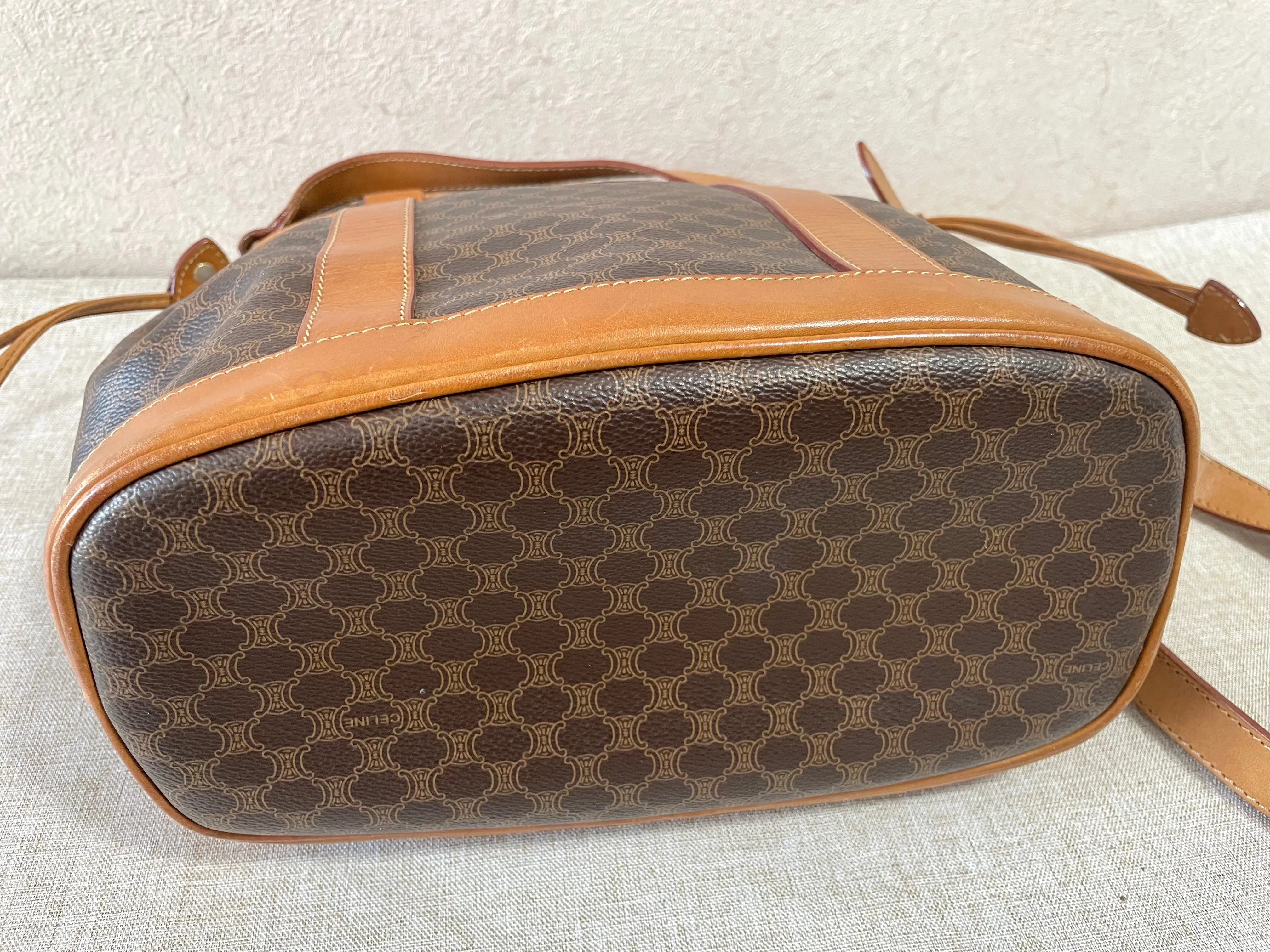 Vintage Celine hobo bucket shoulder bag in classic brown triomphe pattern with leather straps. 070218ys8