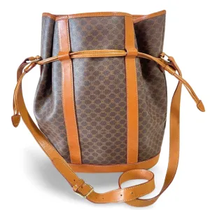 Vintage Celine hobo bucket shoulder bag in classic brown triomphe pattern with leather straps. 070218ys8