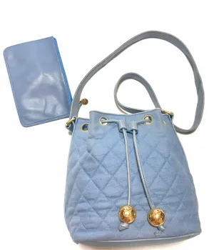 Vintage CHANEL blue quilted canvas and leather combo hobo bucket shoulder bag with drawstrings and golden CC mark balls. 060905r3