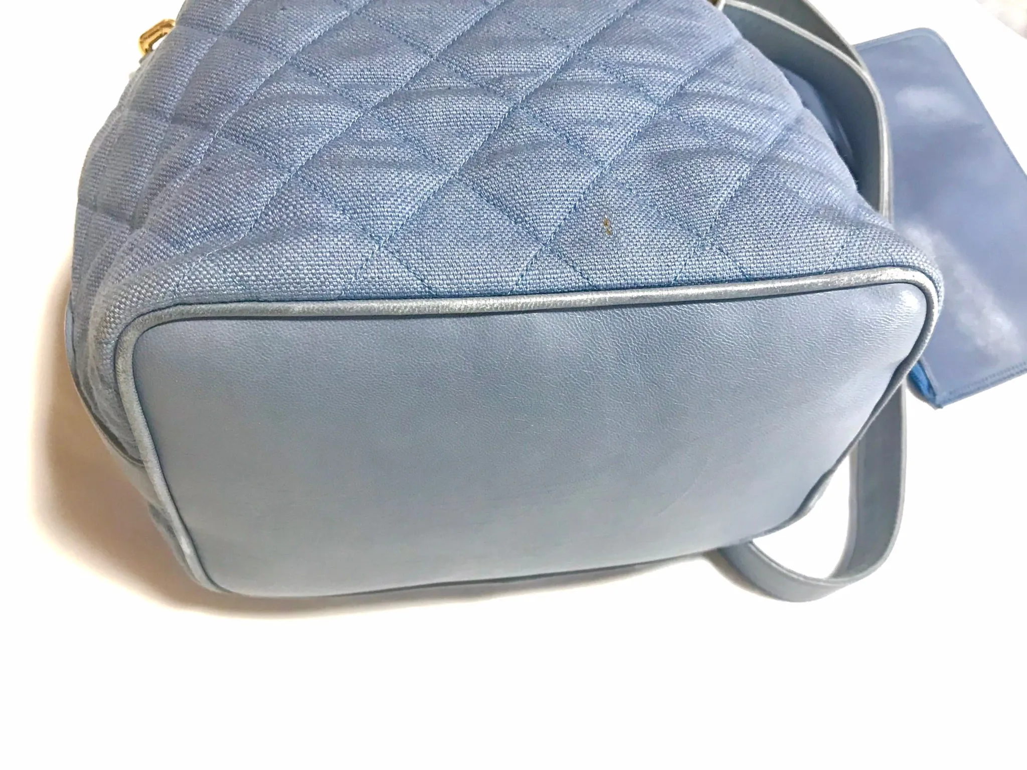Vintage CHANEL blue quilted canvas and leather combo hobo bucket shoulder bag with drawstrings and golden CC mark balls. 060905r3