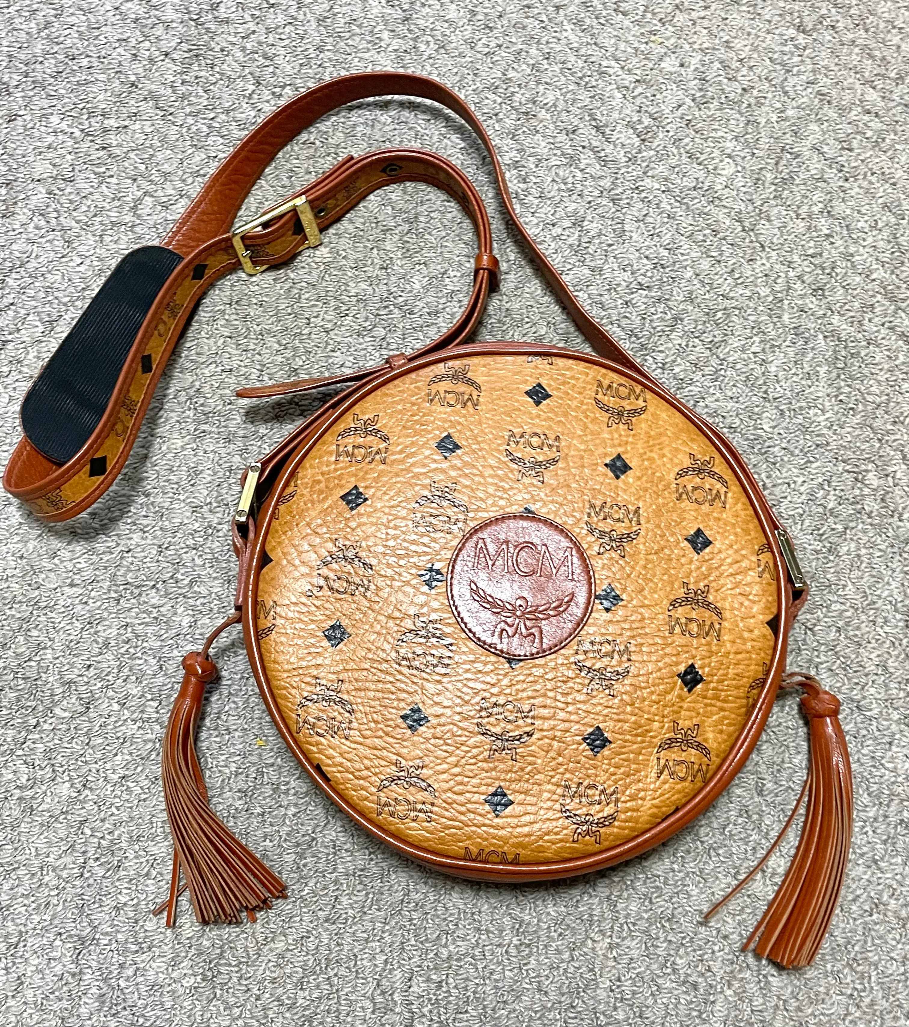 Vintage MCM brown monogram round Suzy Wong shoulder bag with brown leather trimmings. Designed by Michael Cromer. Unisex. 050715ya1