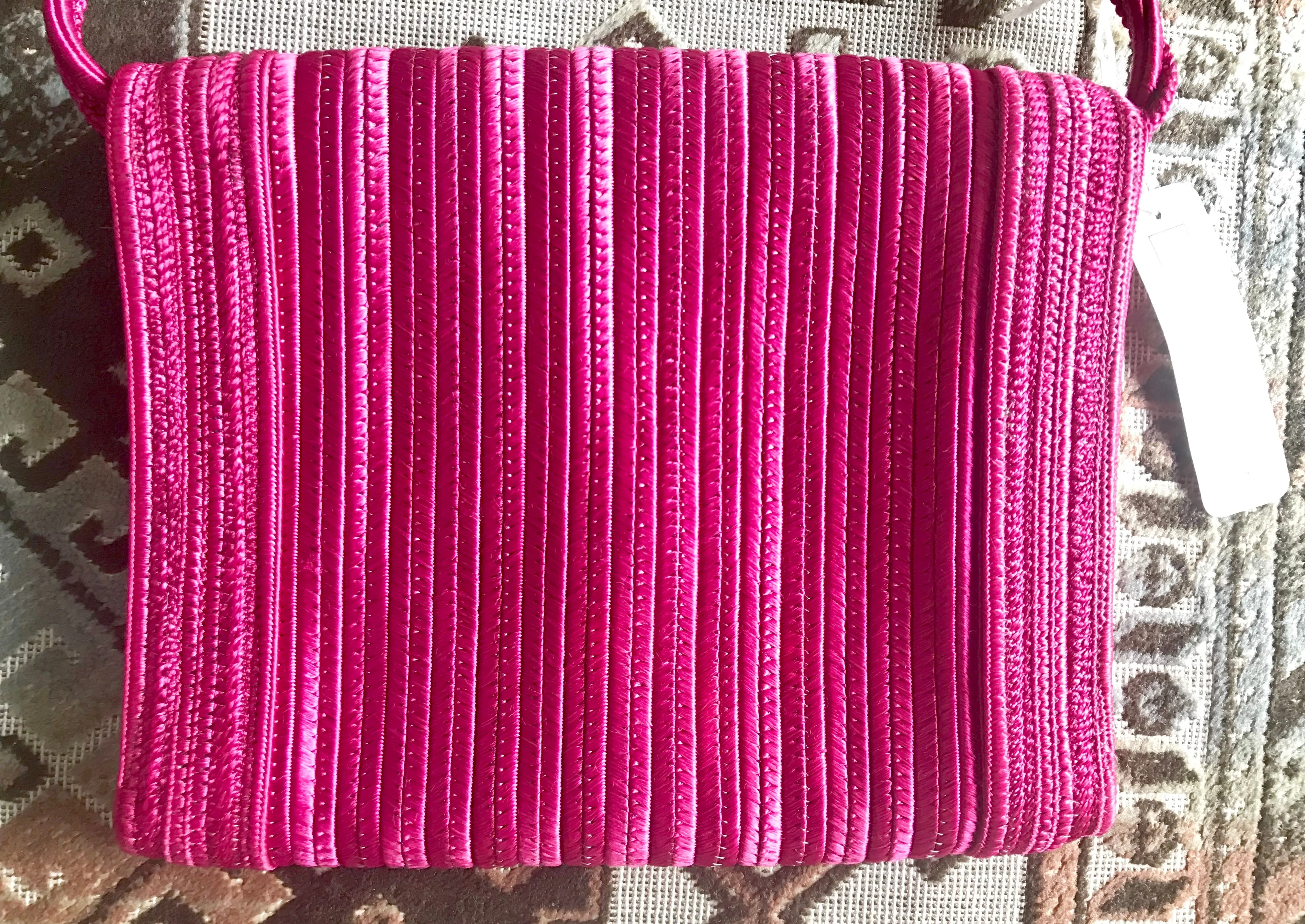 Vintage Nina Ricci hot pink tape fabric shoulder bag/clutch purse with Japanese obi motif and golden logo. So chic.