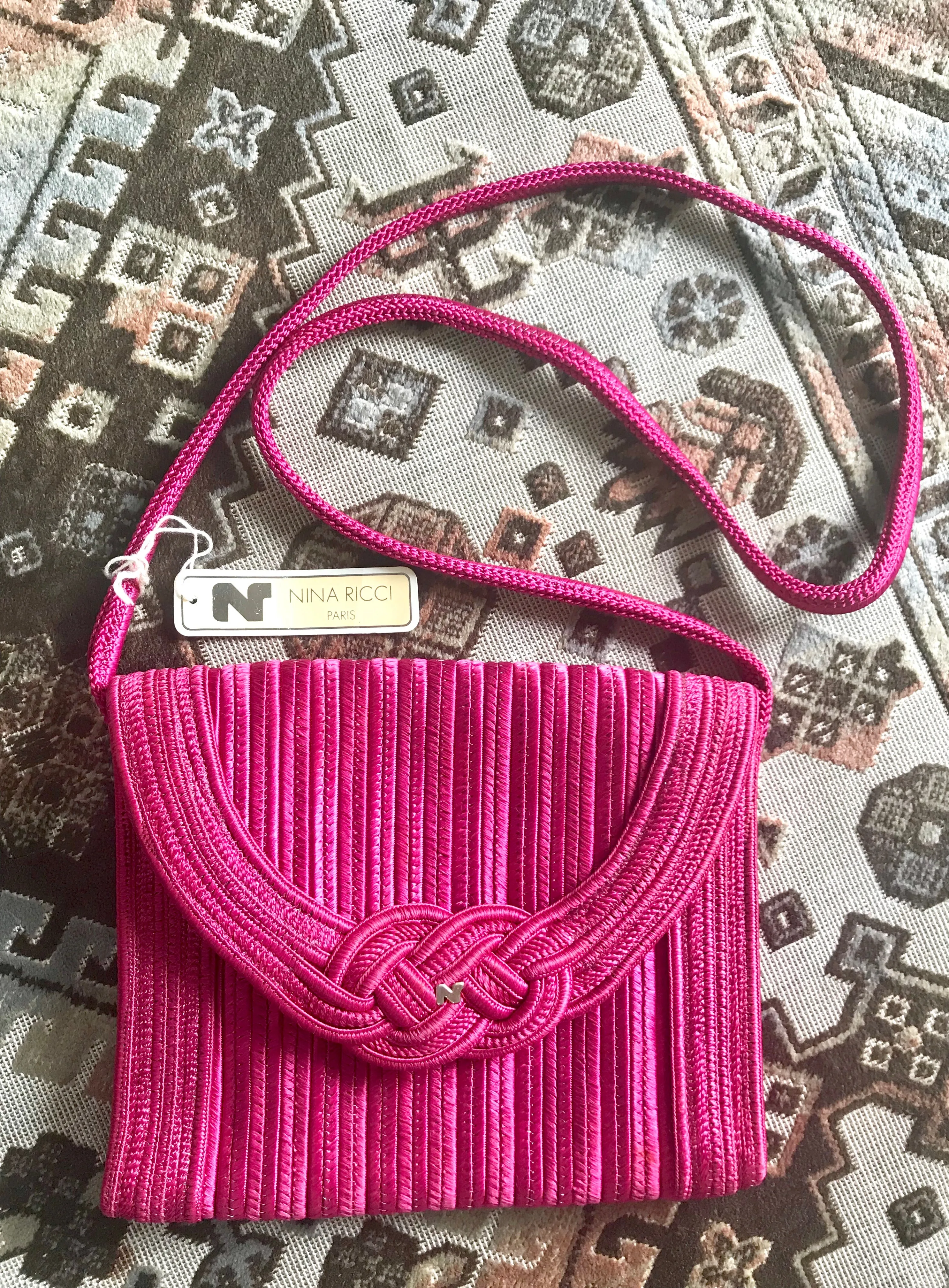 Vintage Nina Ricci hot pink tape fabric shoulder bag/clutch purse with Japanese obi motif and golden logo. So chic.