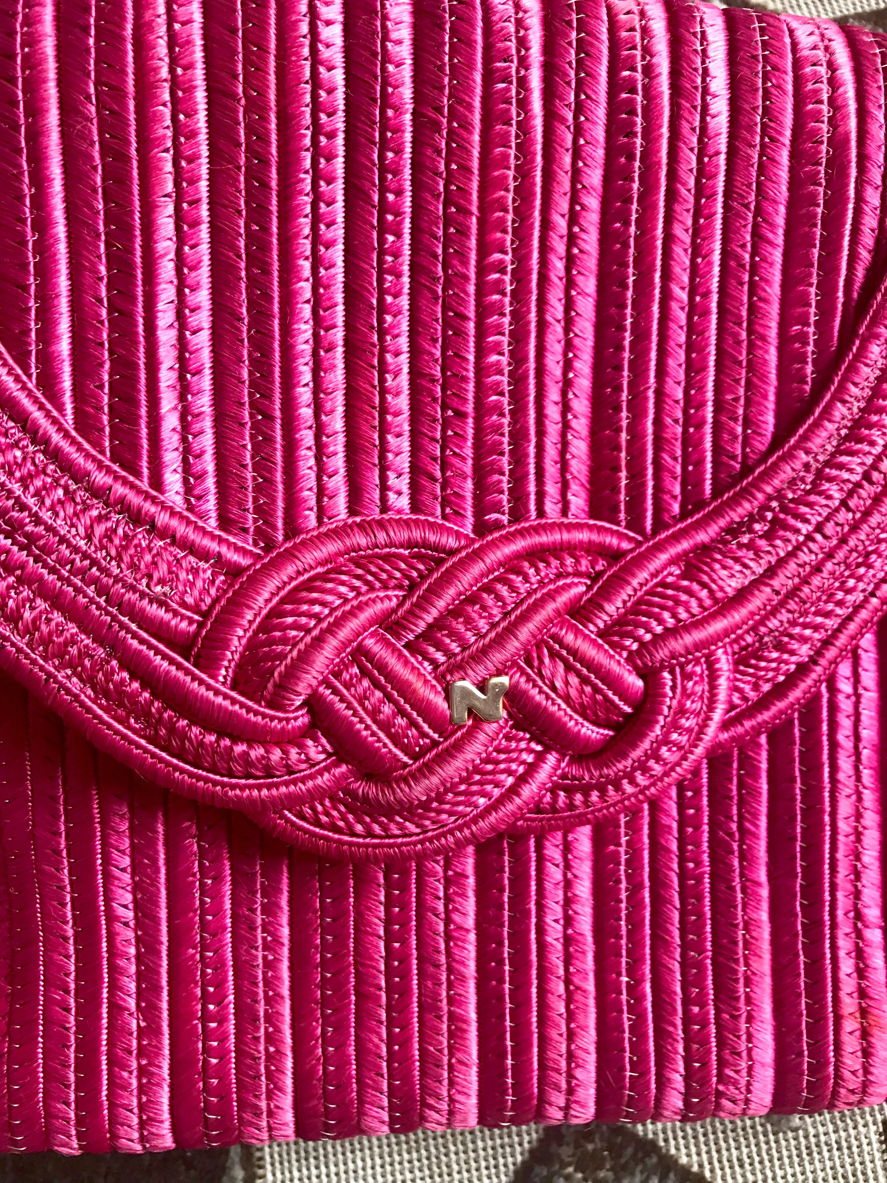 Vintage Nina Ricci hot pink tape fabric shoulder bag/clutch purse with Japanese obi motif and golden logo. So chic.