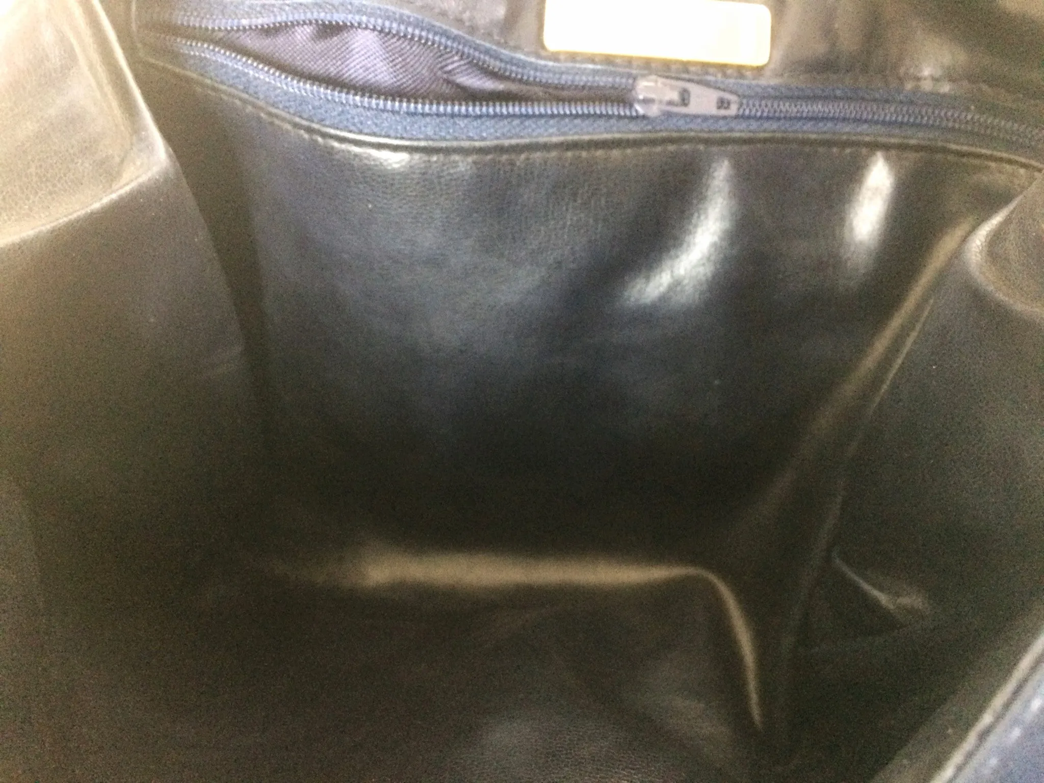Vintage Valentino Garavani, Black nappa leather clutch purse, shoulder bag with tied bow, ribbon and V logo motif at front. 060616r4